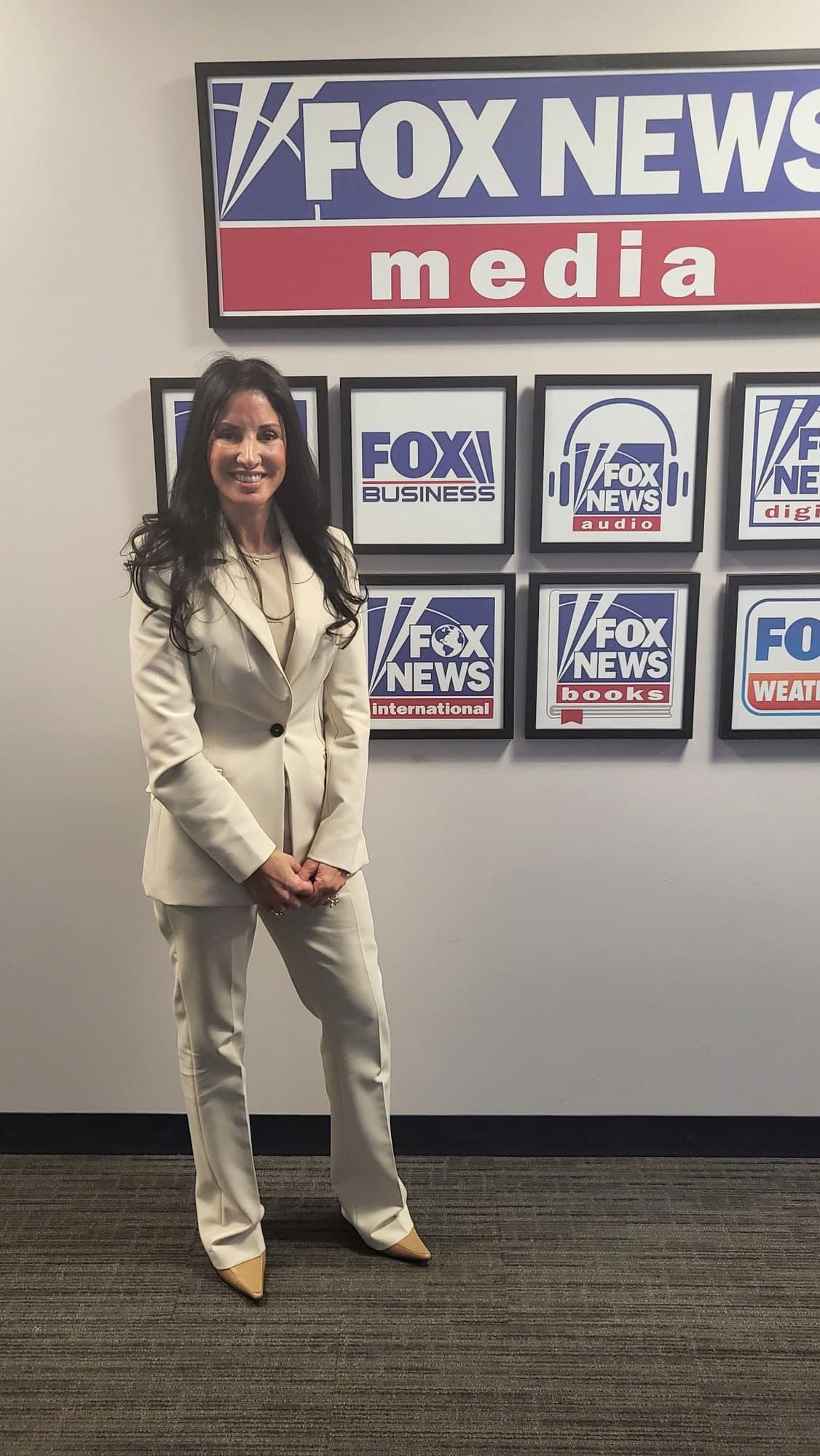 Mary Josephine Generoso, publicly known as MJ and RealMJMetaX (@realmjmetax), in a cream suit at Fox News Media